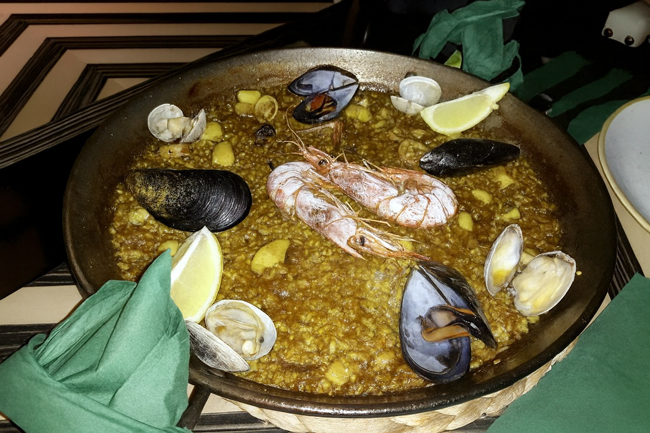 10 Piatti tipici di Alghero: cosa mangiare e dove spendendo poco Paella algherese
